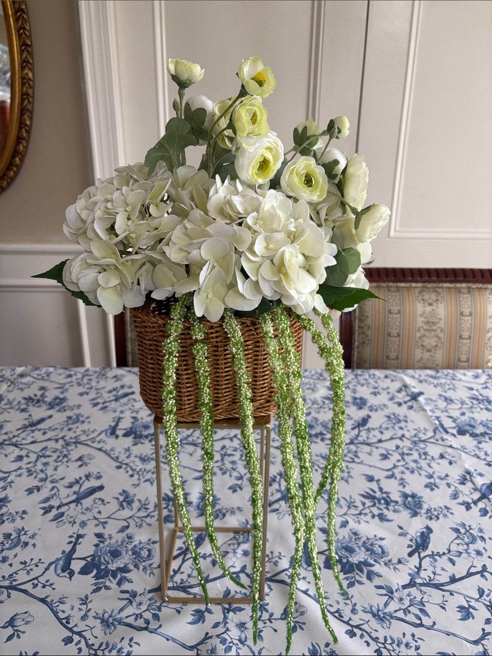 Woven Basket Floral Arrangement with White Hydrangeas and Green Accents